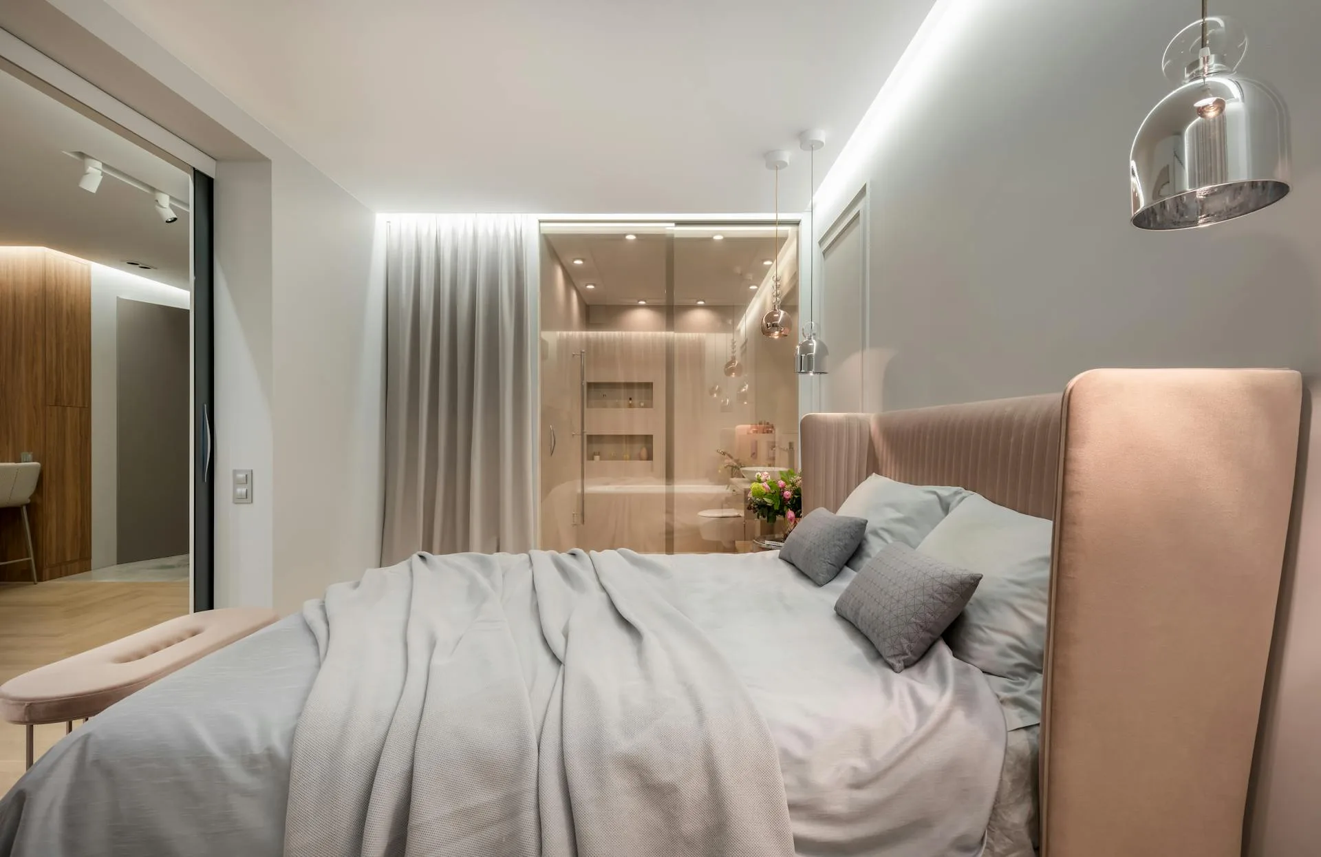 Bedroom with warm evening lighting set by a smart schedule