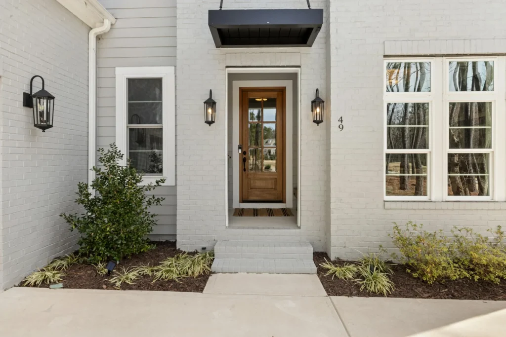 Front door entrance with a smart video doorbell camera