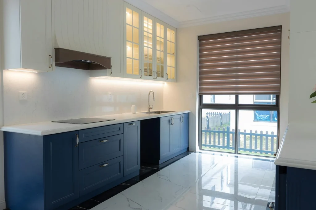 LED light strip glowing warm white under kitchen cabinets