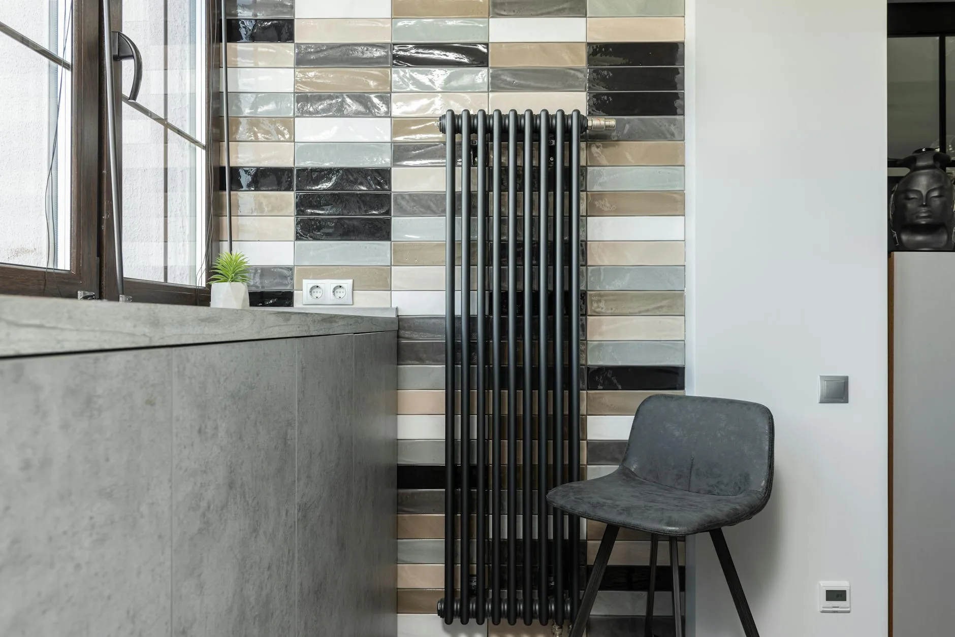 Radiator heating a cosy living room in a UK home