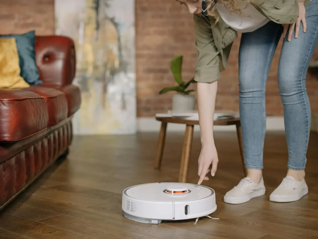Robot vacuum cleaner cleaning a living room floor