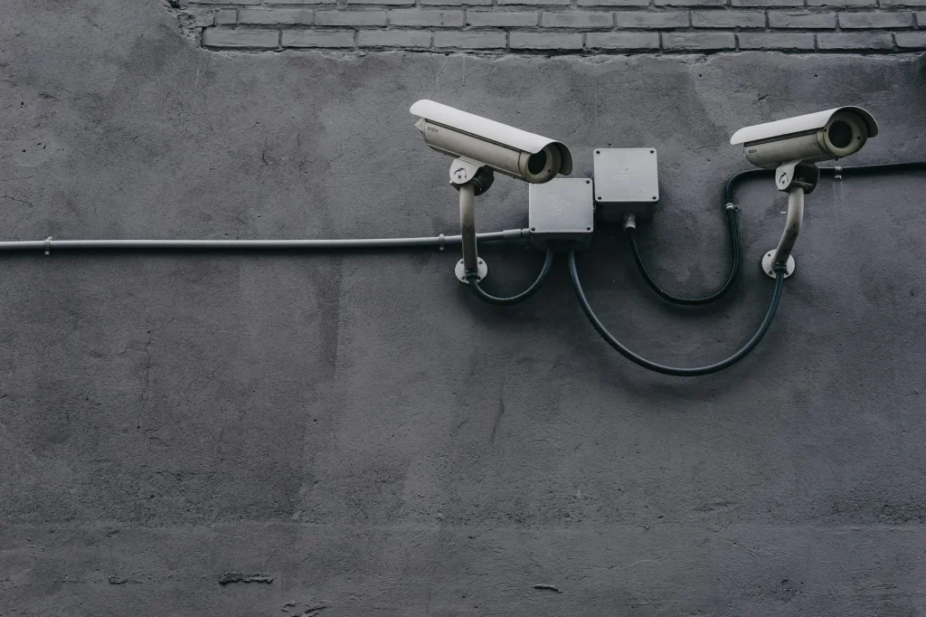 Security camera mounted on the exterior wall of a house