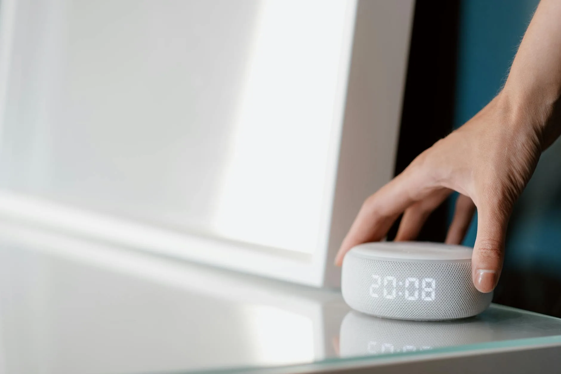 Smart home voice assistant device close-up on a shelf