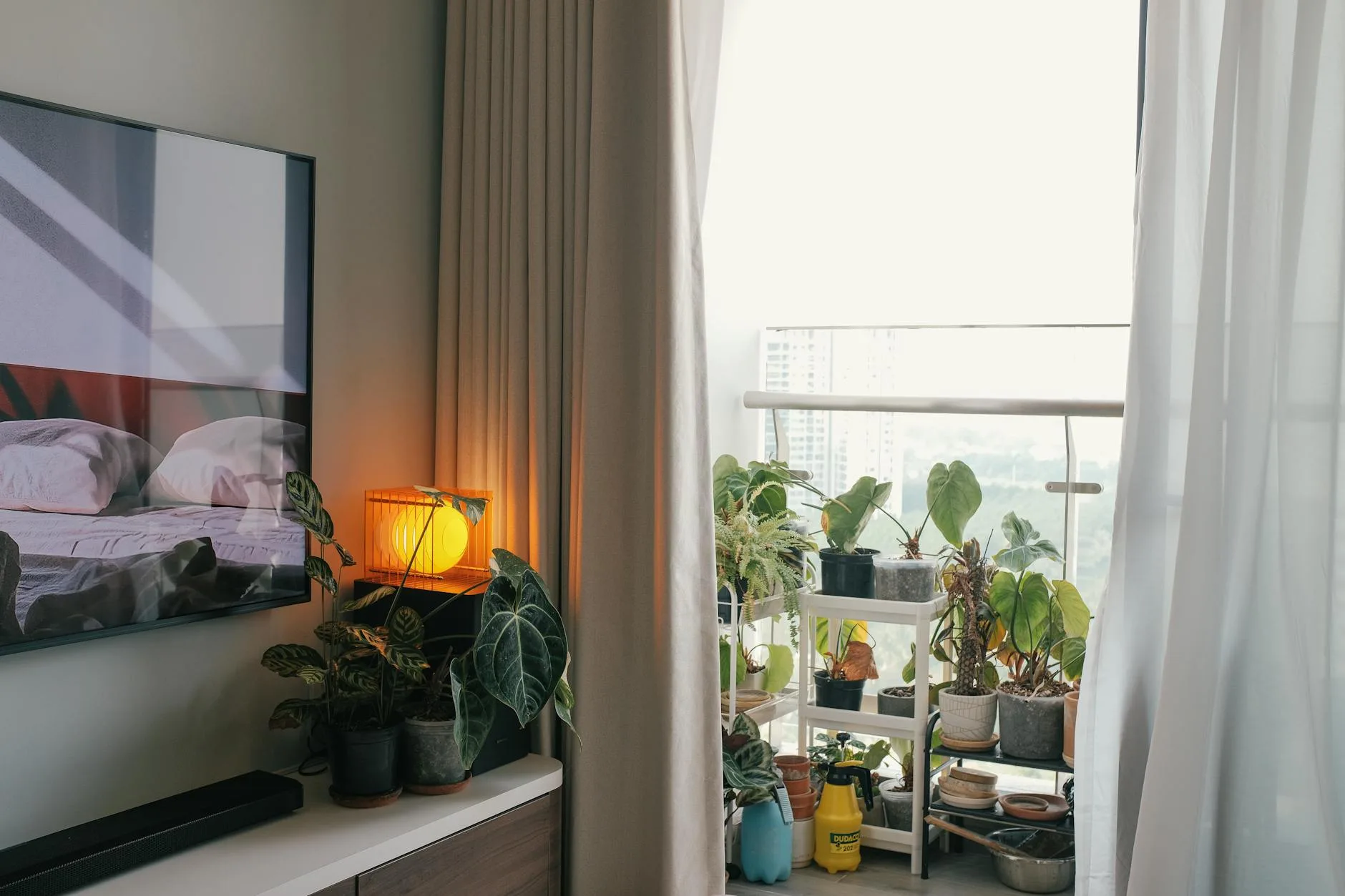 Indoor security camera positioned on a living room shelf