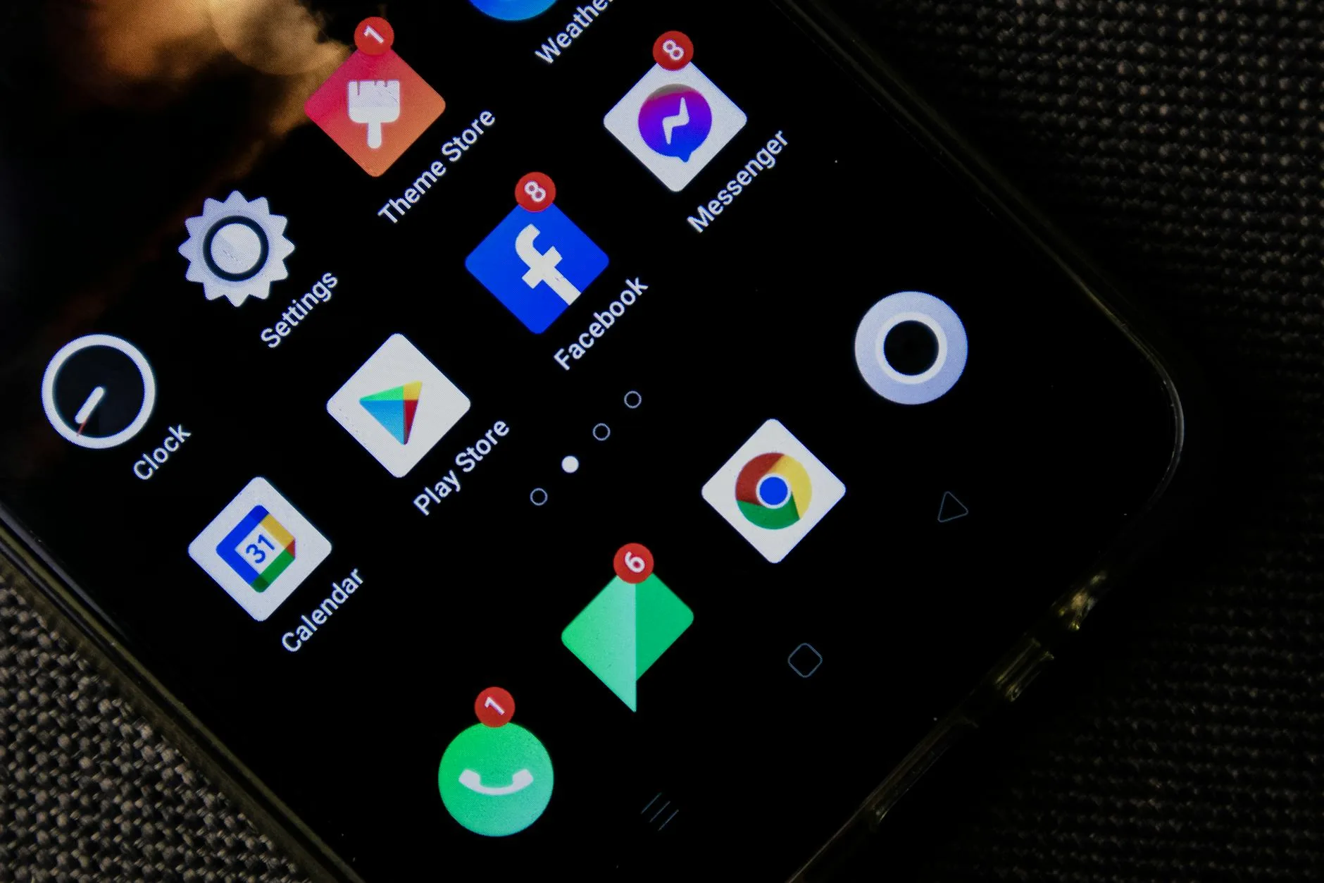 Smartphone showing security camera alerts and live feed