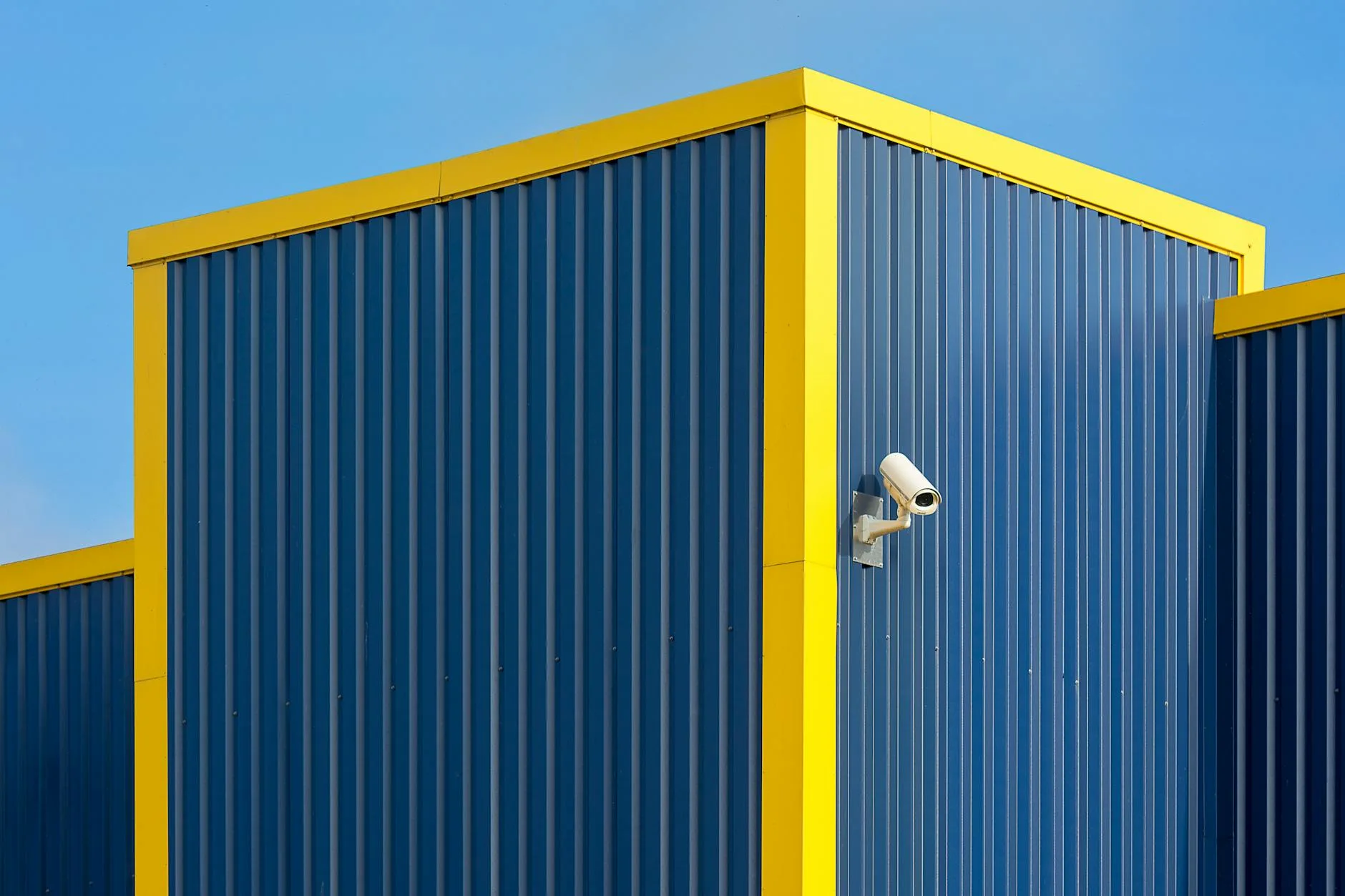 Security camera mounted on the exterior wall of a house