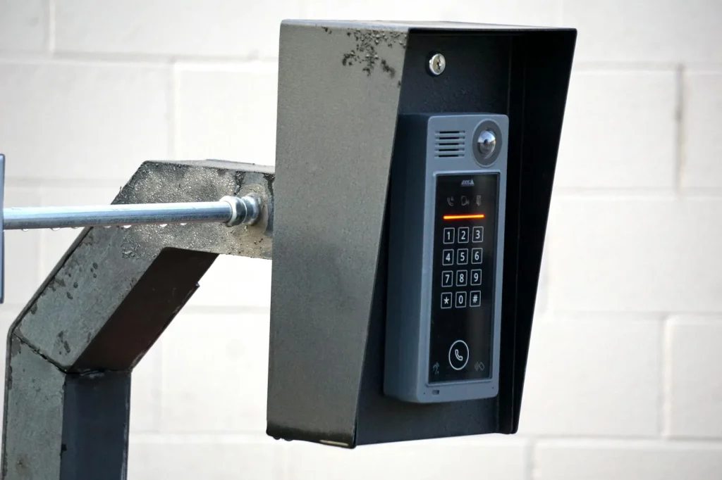 Smart alarm keypad mounted on a wall by the front door