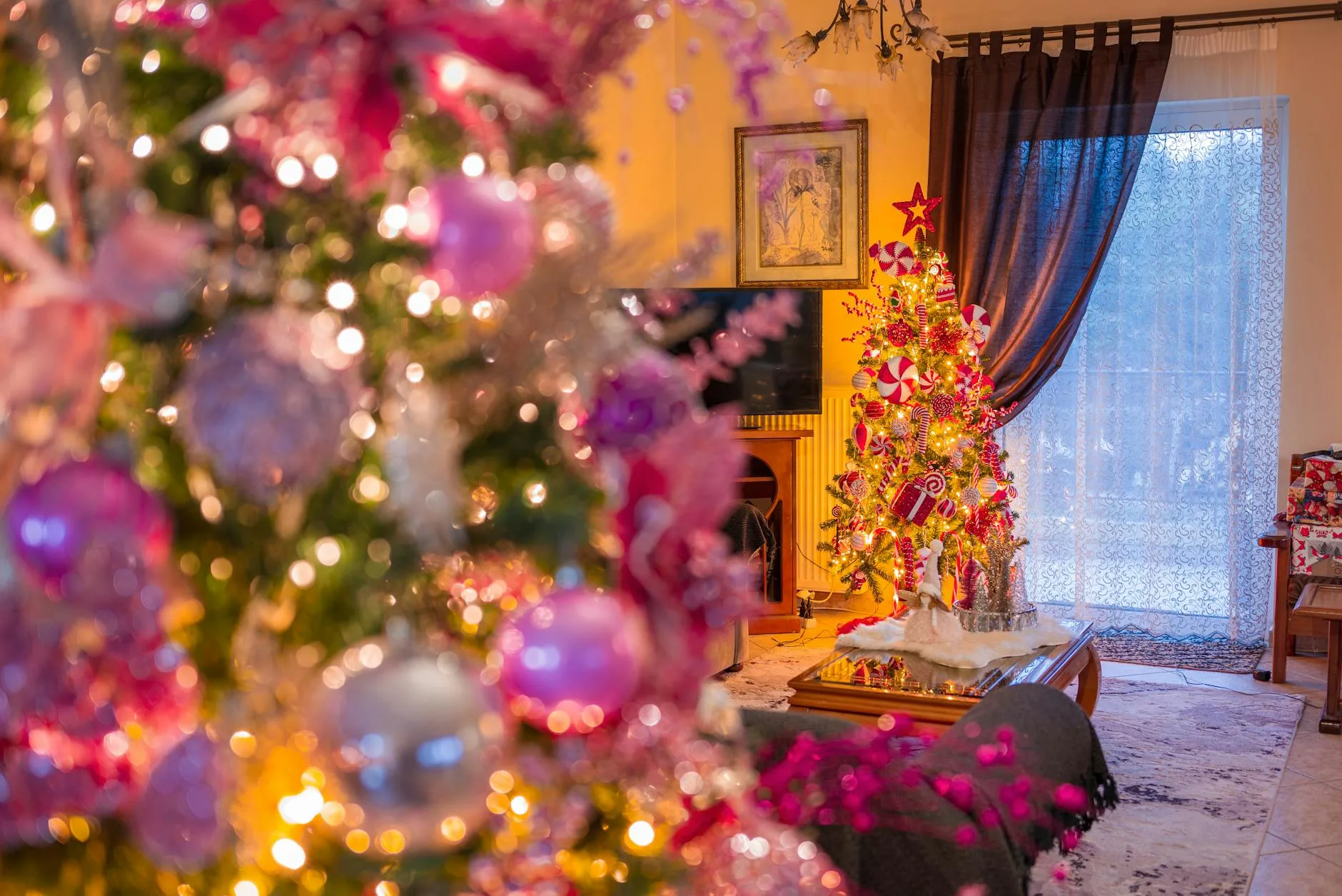 Living room with Christmas tree lights on a cosy evening