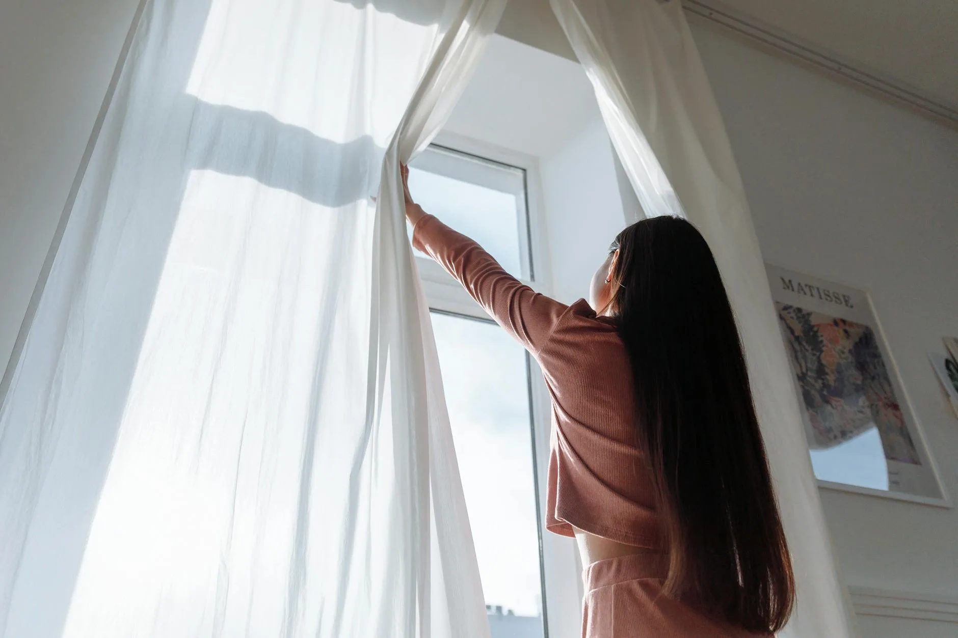 Open window in a bright home room needing sensor protection