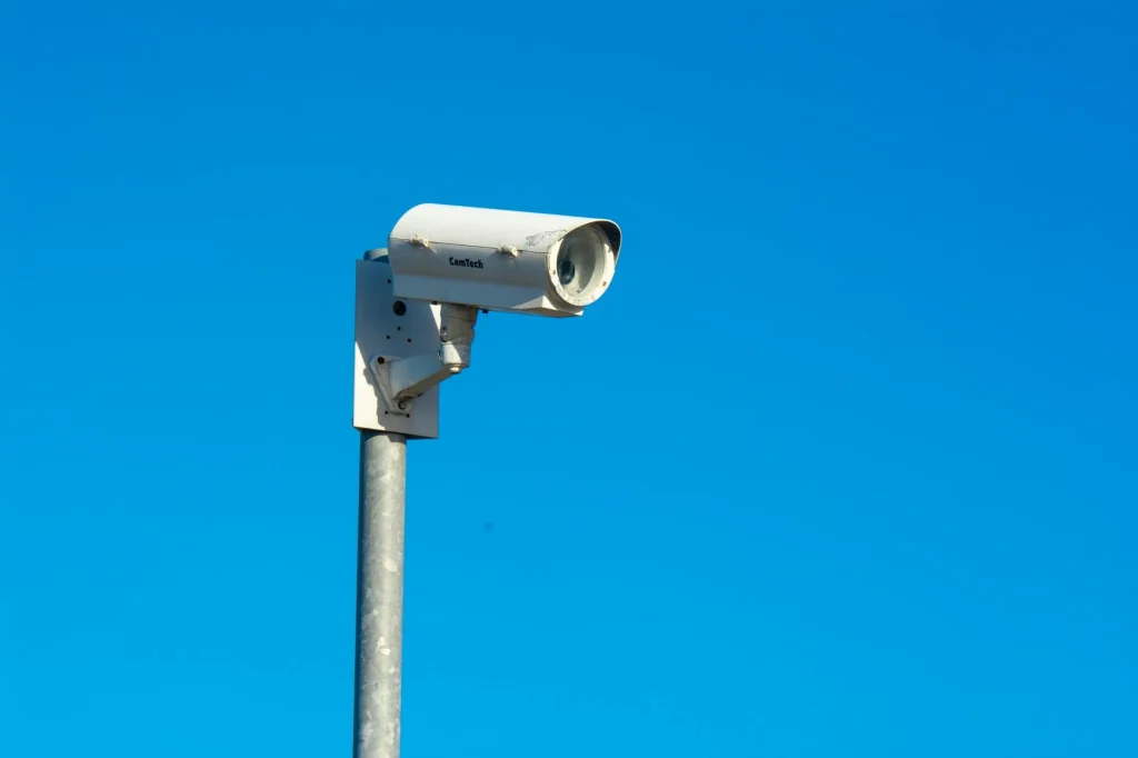 Security camera mounted on the outside of a house